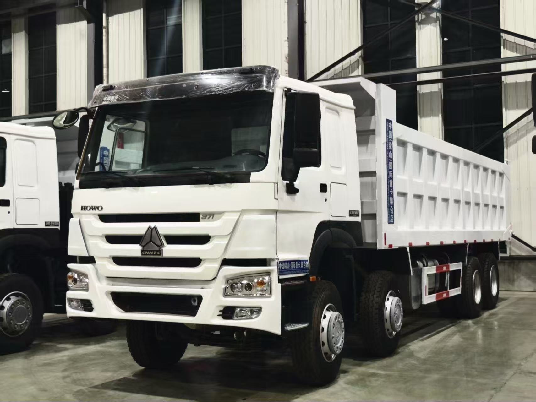 Used HOWO 8x4 dump truck exported to Bolivia for road construction