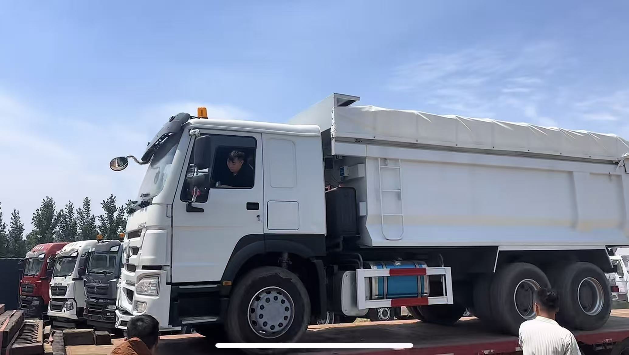 White HOWO dump truck prepared before shipment