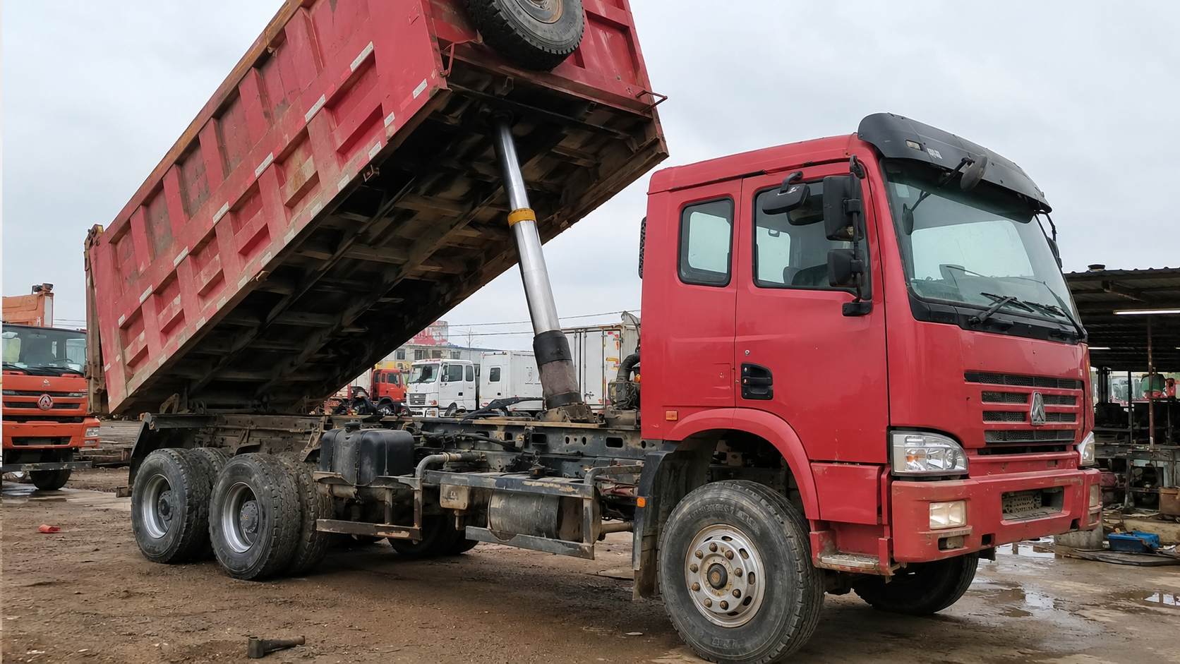 Hydraulic lifting test on a used dump truck before purchase